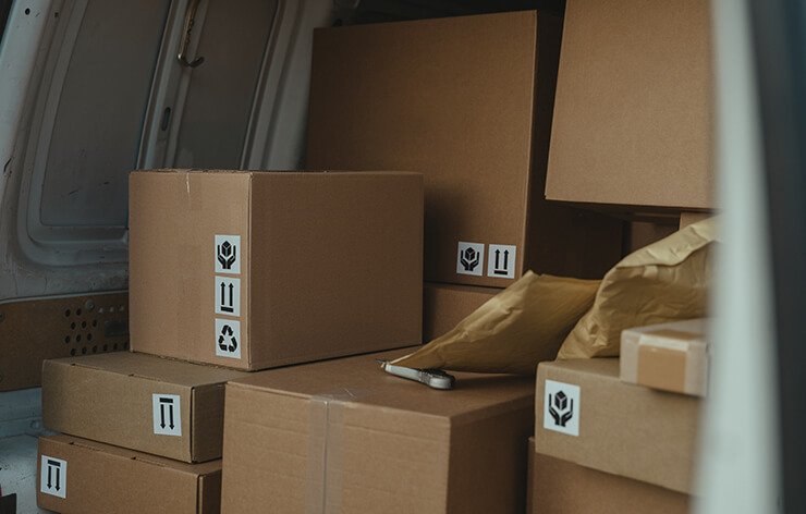 Boxes inside a van to be moved.